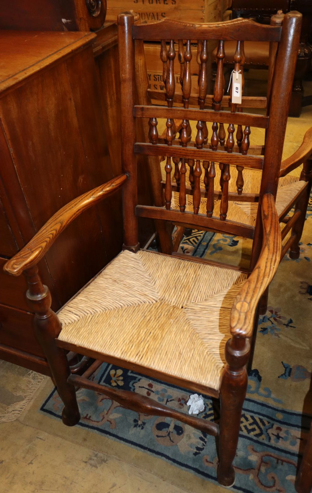 A harlequin set of eight 19th century Lancashire ash rush seat dining chairs, (two with arms)